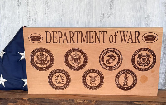 Wood sign with Department of War text and seven military logos